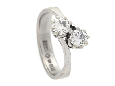 Jewellery, TWO STONE CROSS OVER RING, 18K white gold