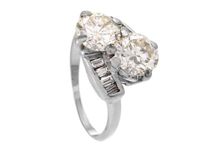 Jewellery, TWO STONE CROSS OVER RING, platinum