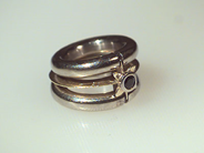 Jewellery, RING, 18K vitgld / gold with sapphire ringsize 16 1/2 mm. weight 52 g. handmade., in auction: Modern – Saturday 4 November 2000