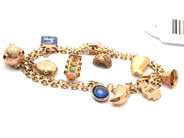 Jewellery, Bracelet X-bracelet 18K 22,9g 19,5cm with 10 charms, in auction: Pawn – Tuesday 21 April 2020