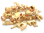 Lot, Bracelet Bismarck 18K 100,4g 18,5cm with 31 charms, of which 5 items i 14K, in auction: Pawn – Tuesday 16 June 2020