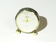 Watches, VÄCKARUR; with green case, in auction: Watches – Saturday 1 March 2003