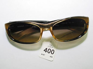 Pawnitems, 1 pair sunglasses ladie´s modell Versace with skinnfodral, in auction: Pawn – Saturday 9 August 2003