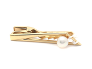 Jewellery, Tie holder 14K 6,2g length: 4,3cm width: 8mm with pearl, in auction: Pawn – Tuesday 29 March 2022