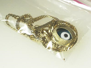 Pawnitems, 1 chain 18K skad, 1 charm 14k.. weight 8g, in auction: Pawn – Saturday 18 October 2003