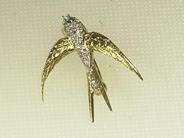 Jewellery, BROOCH, 18K  swallow with diamonds, in auction: Modern – Saturday 17 January 2004