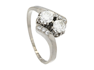 Jewellery, TWO STONE CROSS OVER RING, 18K white gold, in auction: Lilla jewellery – Tuesday 21 October