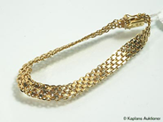 Pawnitems, 1 bracelet "x-link" approx 18cm 18K. weight 12,2g, in auction: Pawn – Thursday 13 April 2006