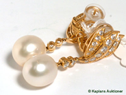 Pawnitems, 2 earrings with oval cultured SouthSeapärla + 36 dia tot approx 2,30ct 18K (se intyg). weight 15g, in auction: Pawn – Thursday 29 June 2006