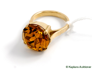 Pawnitems, Ring, with yellow stone Ø16 1/2. 7,2g 18K, in auction: Pawn – Tuesday 8 April 2008