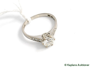 Pawnitems, Ring, 18K white gold SIZE 15¾ with diamond 1 x 0,91ct + 6 small diamonds approx 0,14ct of total weight enligt engraving, in auction: Pawn – Tuesday 24 June 2008
