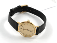 Pawnitems, Ladie´s wristwatch, Movado 18K manual with leatherstrap, in auction: Pawn – Tuesday 11 August 2009