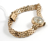 Pawnitems, Ladie´s wristwatch, 14K in case and 18K in bracelet 19cm, in auction: Pawn – Tuesday 11 August 2009