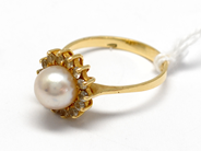 Pawnitems, Ring, with pearl and white stones 18K Ø17 3/4. 3,6g, in auction: Pawn – Tuesday 16 November 2010