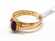 Pawnitems, Ring, skadad/graverad with purple stone 18K 3,9g, in auction: Pawn – Tuesday 16 November 2010