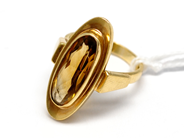 Pawnitems, Ring, with brown stone 18K Ø14 3/4. 3,8g, in auction: Pawn – Tuesday 16 November 2010