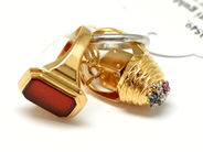 Pawnitems, Lot of gold, with stones and small diamonds 18K engraved/defect 19,4g, in auction: Pawn – Tuesday 22 November 2011