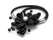 Jewellery, NECKLACE, rubber strap, in auction: Classic – Saturday 17 December 2011