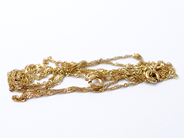 Pawnitems - Piece of gold, 18K damaged 2,4 g - View 1
