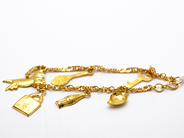 Pawnitems, Bracelet, with seven charms 21K 16cm 6,1g, in auction: Pawn – Tuesday 5 June 2012