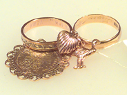 Pawnitems, 2 RINGS, 3 BERLOCKE weight 18,0g., in auction: Pawn – Saturday 6 March 1999