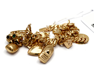 Jewellery, Bracelet, with 15 items charms 19cm 18K 35,7g, in auction: Pawn – Tuesday 5 November 2013