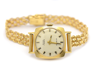 Lot, Ladie´s wristwatch, X-bracelet 16cm 18K in case and bracelet gross weight: 19,2g, in auction: Pawn – Tuesday 5 November 2013