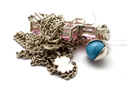 Lot, Necklace "curb" 52,5cm, Bracelet "curb" with charms 16cm, in auction: Pawn – Tuesday 5 November 2013