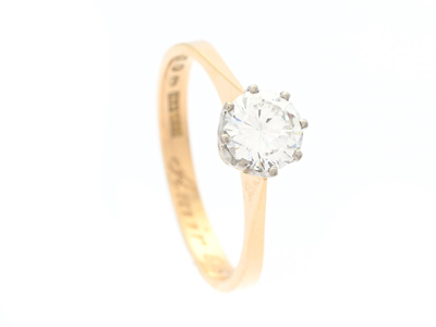 Smycken, ENSTENSRING, briljantslipad diamant 0,53 ct enligt gravyr