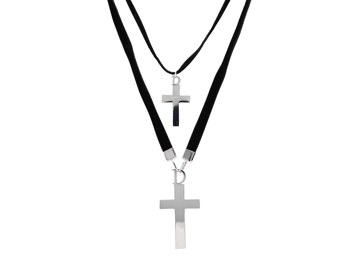 COLLIER, CHRISTIAN DIOR, två st collier, svart sammetband, silverfärgad metall, kors, märkt Dior, längd på band med större kors 50 cm, den mindre justerbar längd 38-42 cm, längd på kors 5 cm, samt 3 cm, ask.
