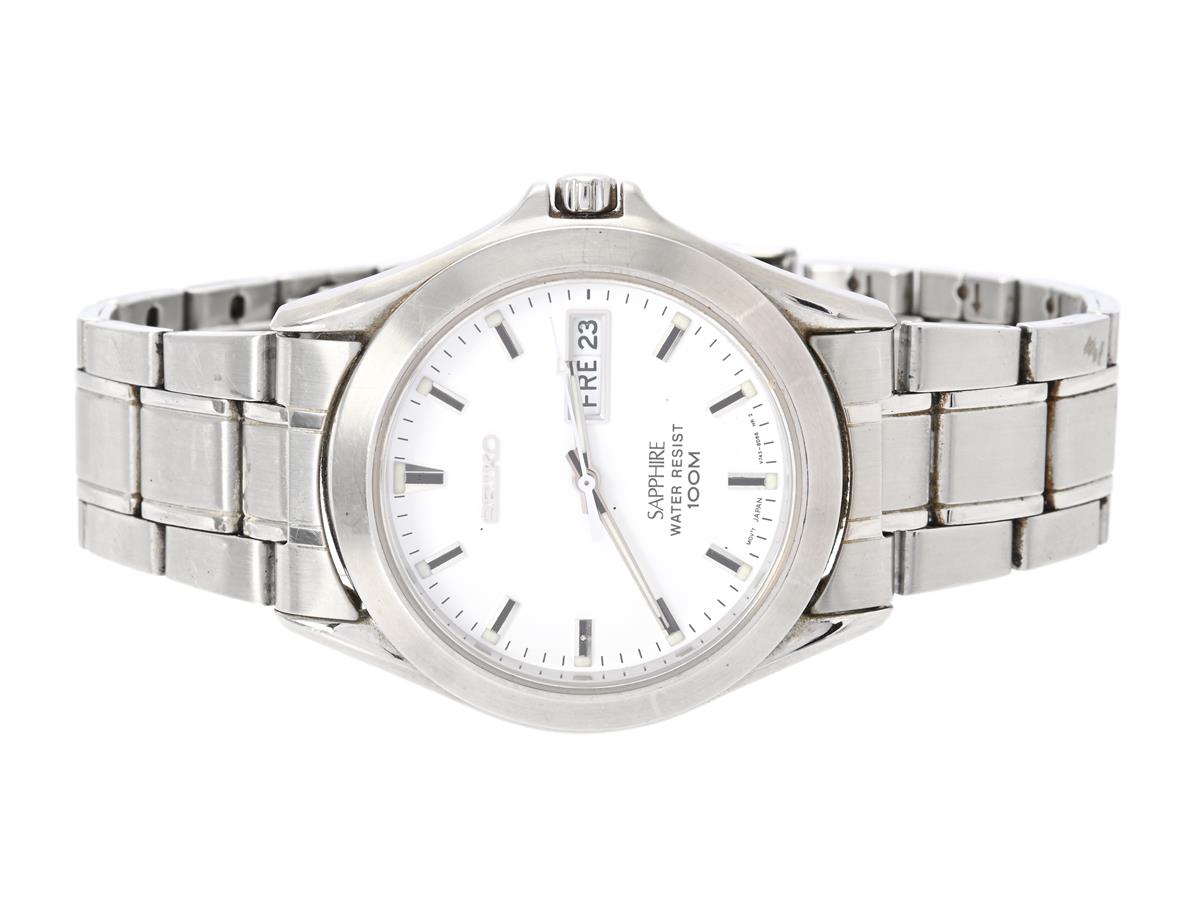 SEIKO, Sapphire, Serie nr. 2N5543, Boett nr. V743-8B50, herrur, 37,5 mm, stål, quartz (går ej), safirglas, dag, datum, skadad urtavla, originallänk, viklås, ca 1992.