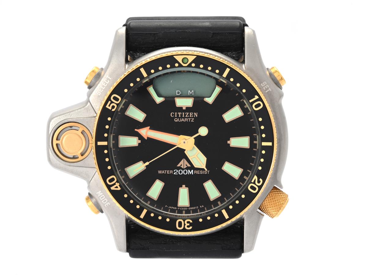 CITIZEN, Aqualand (200M), Serie nr. 1042962, Boett nr. C022-088093 Y / GN-4-S, herrur, 51 x 39,5 mm, analog/digital, bicolour, quartz, mineralglas, defekt (går ej, akut servicebehov), gummiband, ca 1991, box (till annan modell).