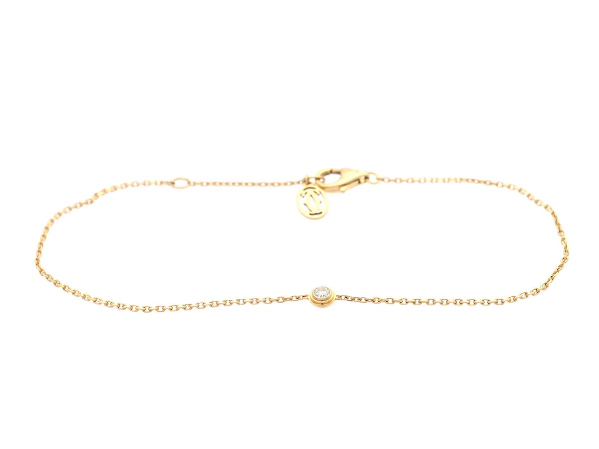 CARTIER, armband, d'Amour, minimodell, 18K guld, briljantslipad diamant ca 0,04 ct, ca TW/VS, serienummer NDE 459, längd 16,5-18,5 cm, vikt 1,4 g, en ögla något skev, certifikat, etui till ring, ytterkartong, reseetui,