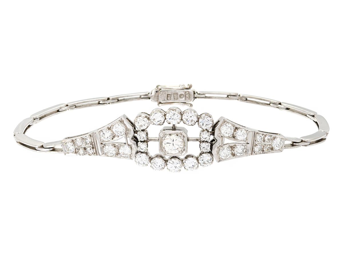 ATELIER AJOUR, armband, 18K vitguld, briljantslipad diamant ca 0,25 ct, ca TCr/VS, 32 briljant- och åttkantslipade diamanter ca 1,60 ctv, ca TW-TCr/VS-SI, Stockholm 1959, längd 16,5 cm, vikt 12,0 g, enstaka diamanter med nagg, etui.