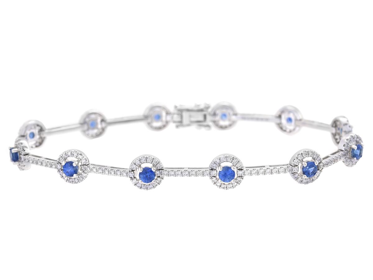 ARMBAND, 18K vitguld, 12 runda fasettslipade blå safirer 1,57 ctv, 252 briljantslipade diamanter 1,22 ctv, ca TW-W/VS-SI, längd 18 cm, vikt 9,6 g.