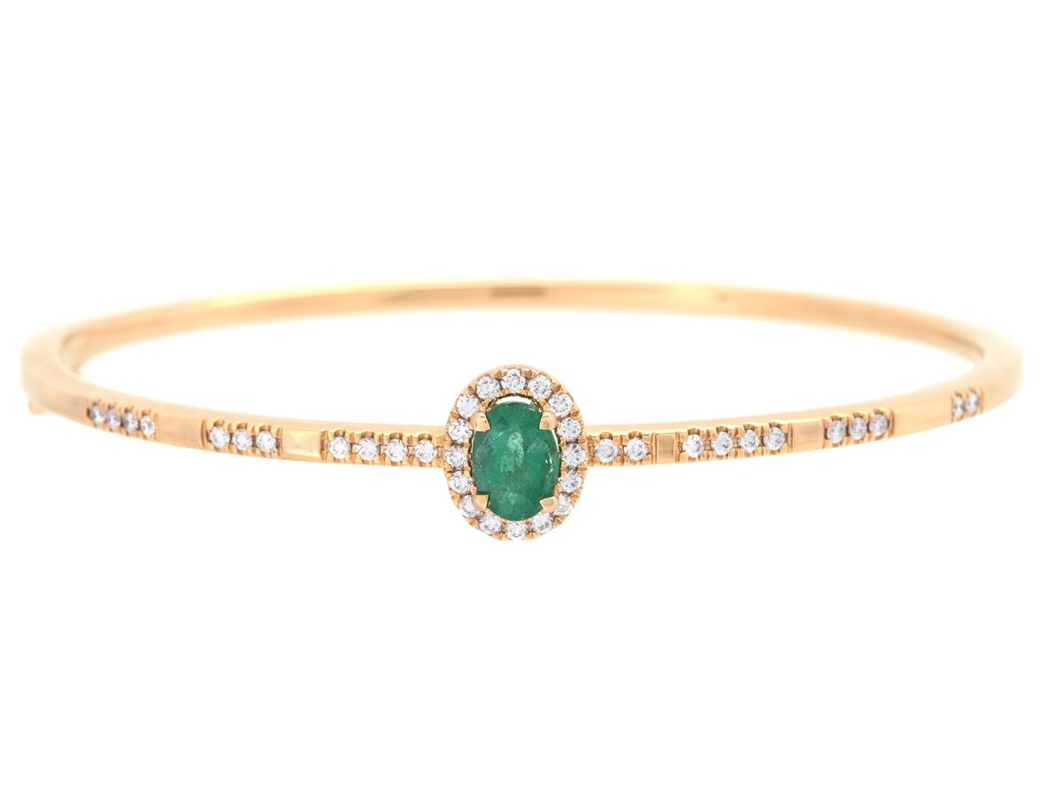 ARMRING, 18K guld, oval fasettslipad smaragd 0,68 ct, 38 briljantslipade diamanter 0,38 ctv, ca TW/VS-SI, innermått ca 60x50 mm, vikt 16,1 g.