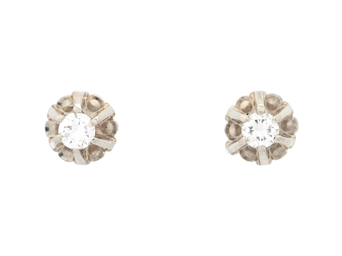 ENSTENSÖRHÄNGEN, 18K vitguld, briljantslipade diamanter ca 0,14 ctv, ca W/VS, stift, vikt 1,2 g.