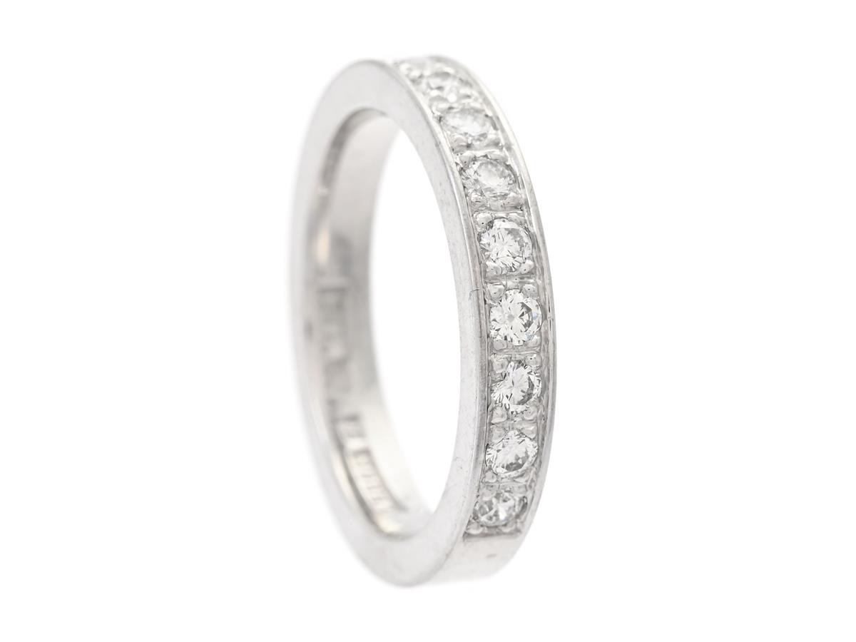 ALLIANSRING, 18K vitguld, briljantslipade diamanter ca 0,20 ctv, ca TW/VS, Guveau AB, stl 15,25 mm, vikt 4,5 g.