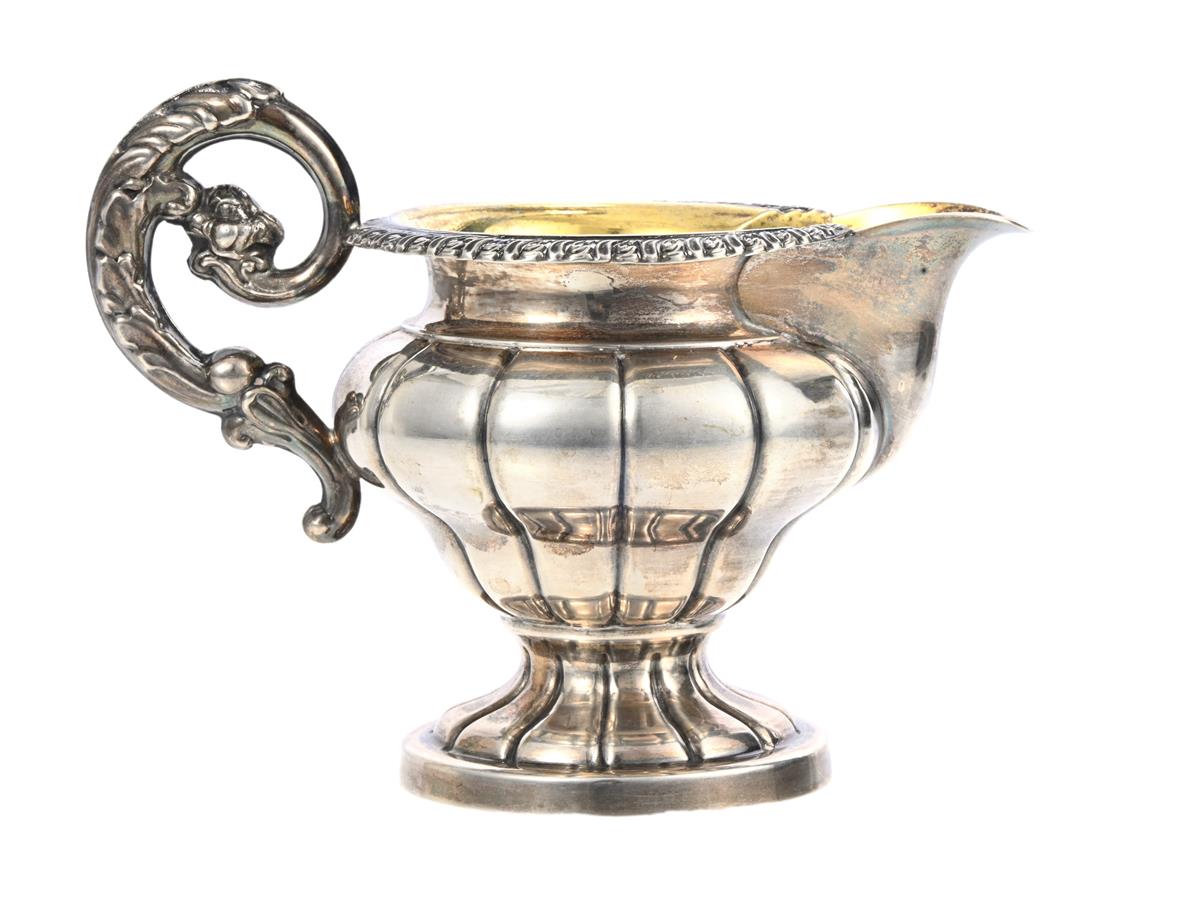GUSTAF MÖLLENBORG, gräddkanna, silver, invändigt förgylld, nyrokoko, uppsvängd hänkel, godronnerad, Stockholm 1838, höjd 113 mm, vikt 210,7 g.