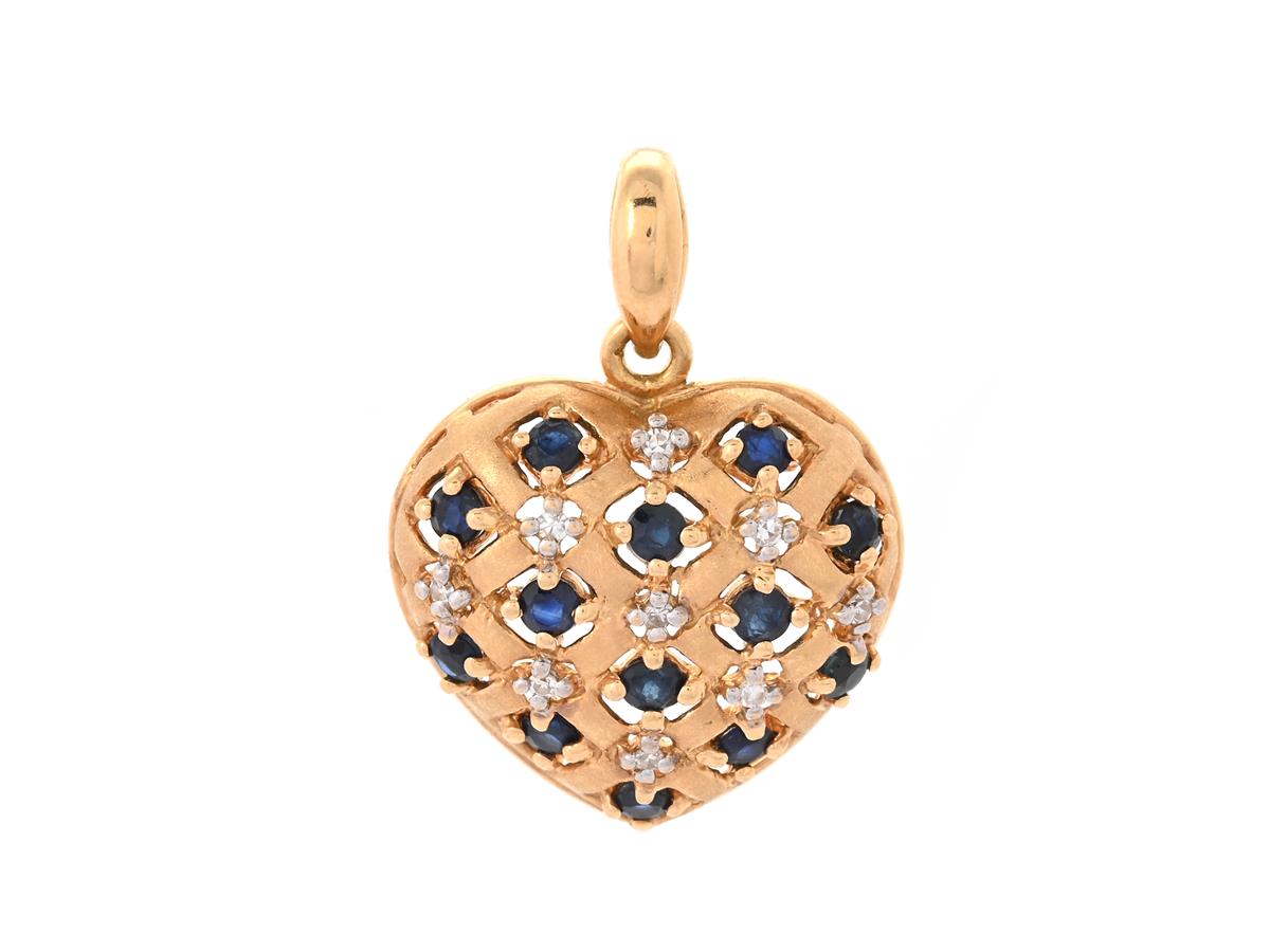 HÄNGE, 18K guld, hjärta, mörkblå safirer, 9 åttkantslipade diamanter ca 0,03 ctv, höjd 26 mm, vikt 2,0 g.