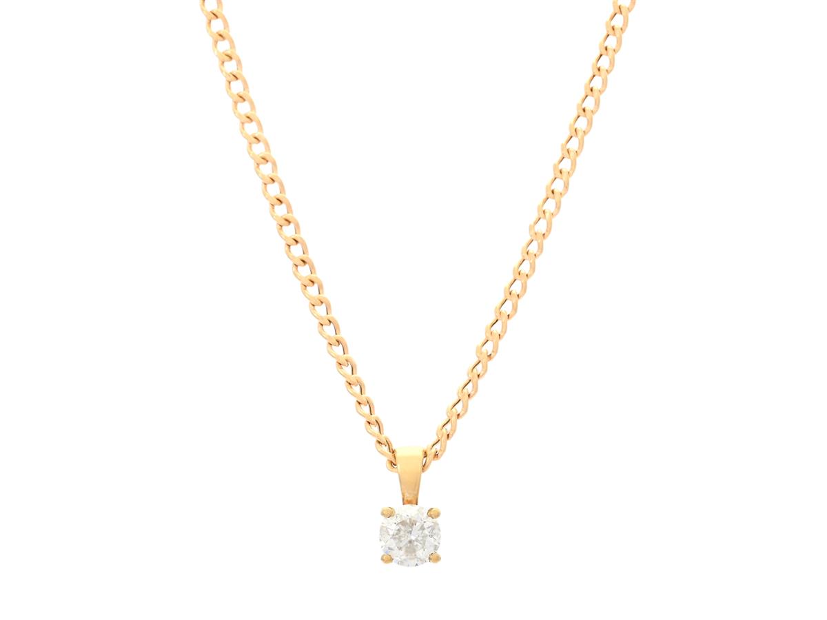 ENSTENSHÄNGE MED KEDJA, 18K guld, briljantslipad diamant ca 0,70 ct, ca Cr/P, längd på kedjan 42 cm, vikt 3,3 g, diamanten med naturaler samt nagg på kuletten.