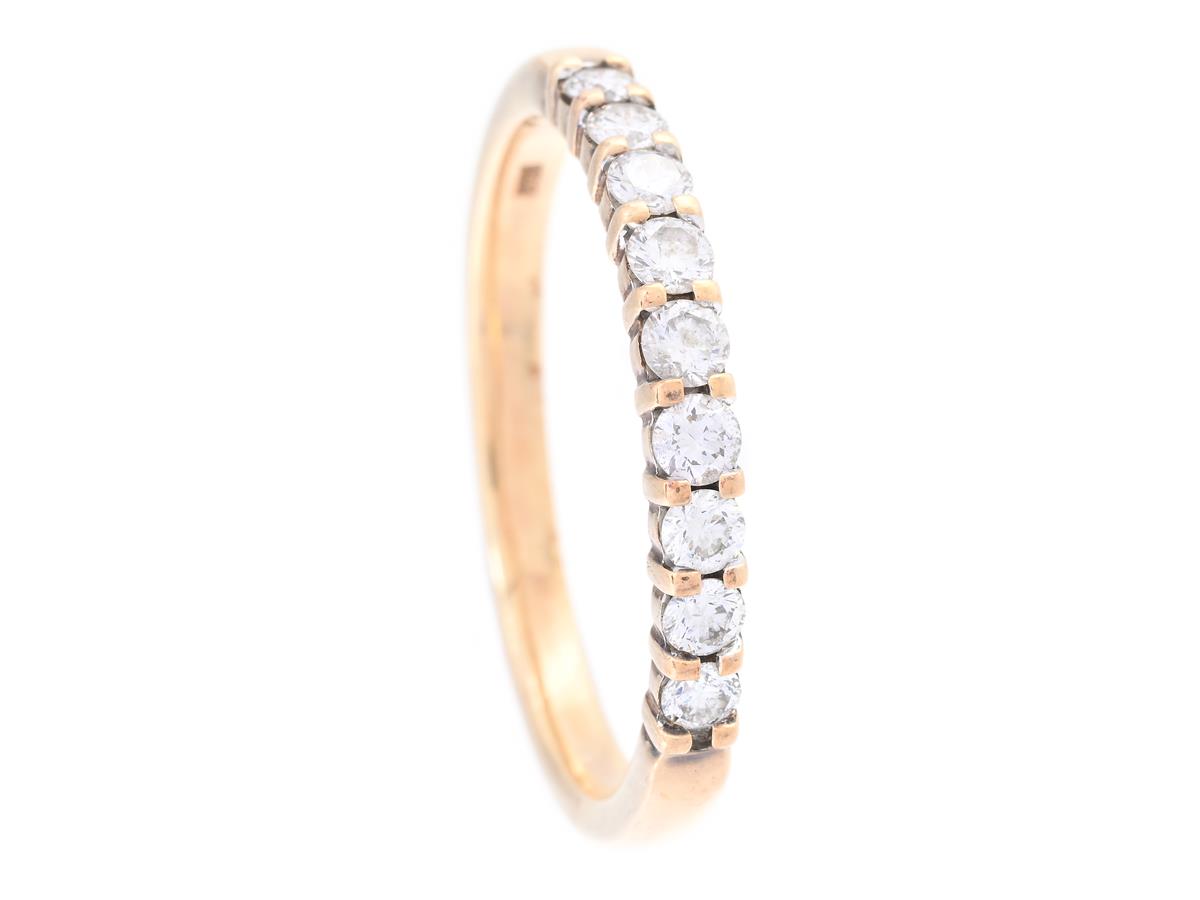 ALLIANSRING, 18K guld, 9 briljantslipade diamanter ca 0,45 ctv, ca W/SI, stl 20 mm, vikt 3,7 g.