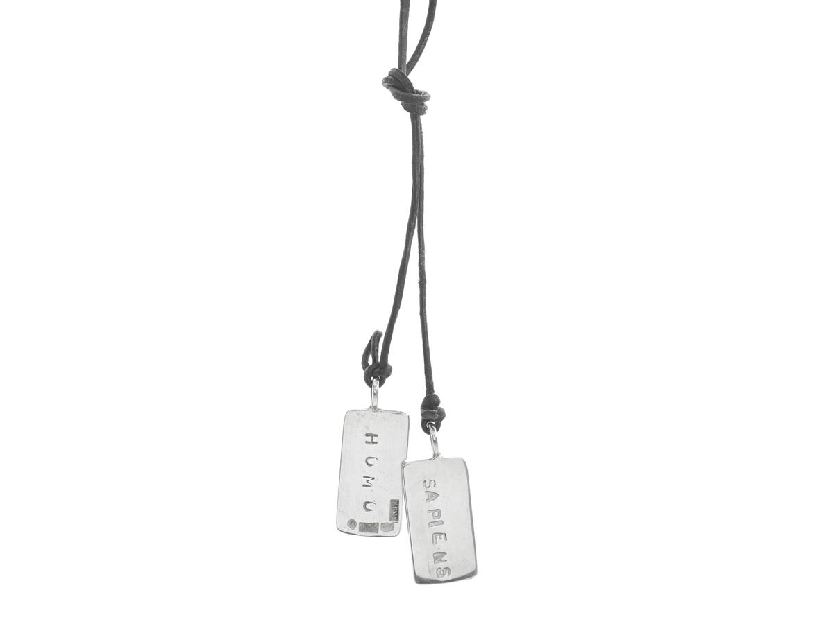 EFVA ATTLING, collier, Homo Sapiens Necklace, sterlingsilver, läderband, mått dekor 12 x 23 mm, längd 56 cm, vikt 6,9 g, originalask.