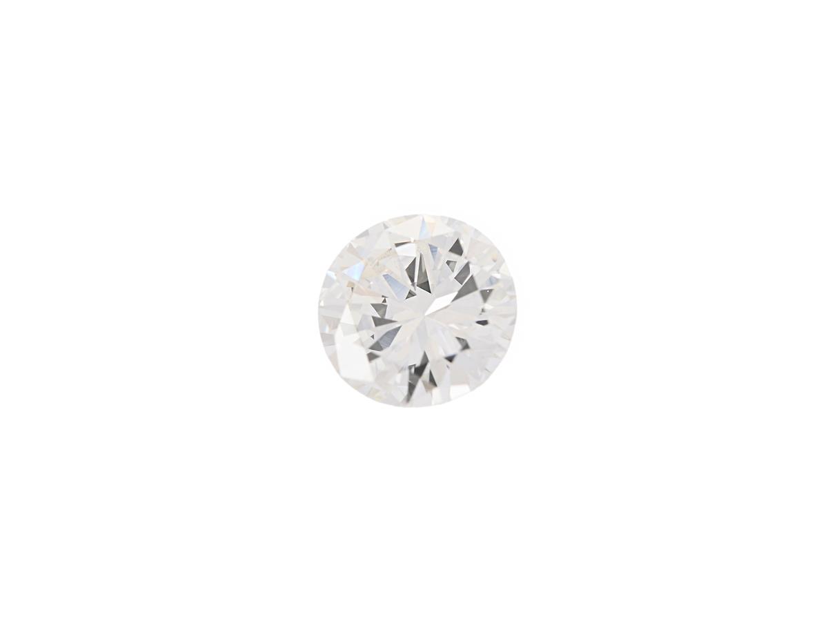 DIAMANT, briljantslipad, 0,61 ct, W(H)/SI1, liten extra fasett vid rondisten, nagg på kuletten.