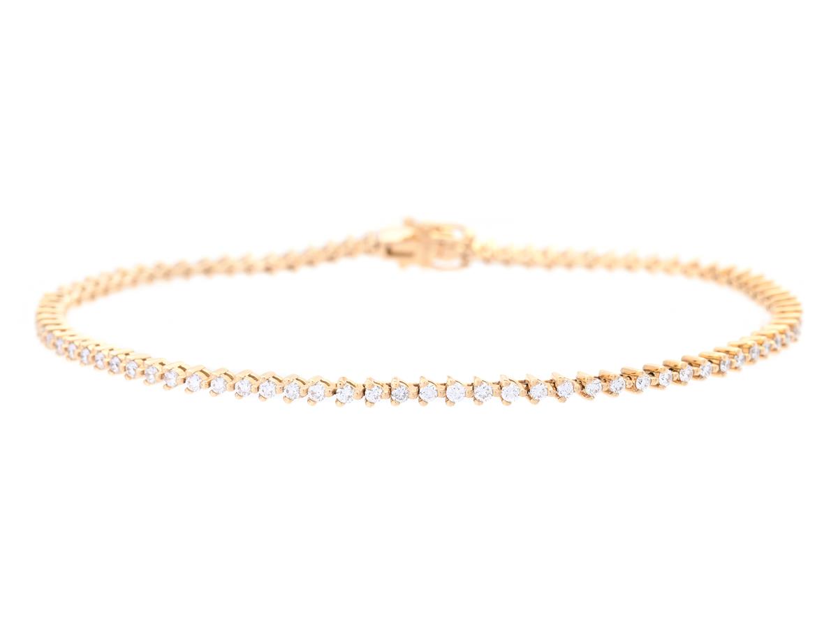 TENNISARMBAND, 18K guld, 86 briljantslipade diamanter ca 1,12 ctv, TW/VS-SI, längd 18 cm, vikt 7,2 g.