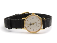 Klockor, Tissot Damur 18K graverad quartz/går ej med läderarmband , i auktion: Pant – Tisdag 10 november 2015