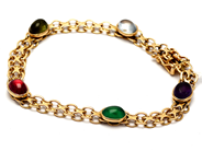 Smycken, Armband x-länk 18K 13,6g 19,3cm, med färgade stenar , i auktion: Pant – Tisdag 5 mars 2019
