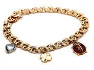 Smycken, Armband 18K 21,2g 20,2cm Bismarck med berlocker, i auktion: Pant – Tisdag 23 april 2019