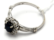 Smycken, Ring 18K 3,7g Ø18¼ vitguld med sten och diamanter 12xca0,02ct , i auktion: Pant – Tisdag 23 april 2019