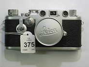 Pantvaror, 1 kamerahus Leica DBP crom med objektiv summicron 50mm 1:2, i auktion: Pant – Lördag 9 augusti 2003